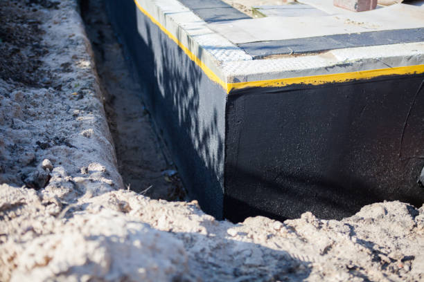 Professional Interior Drainage System technician working in Baldwinsville, NY